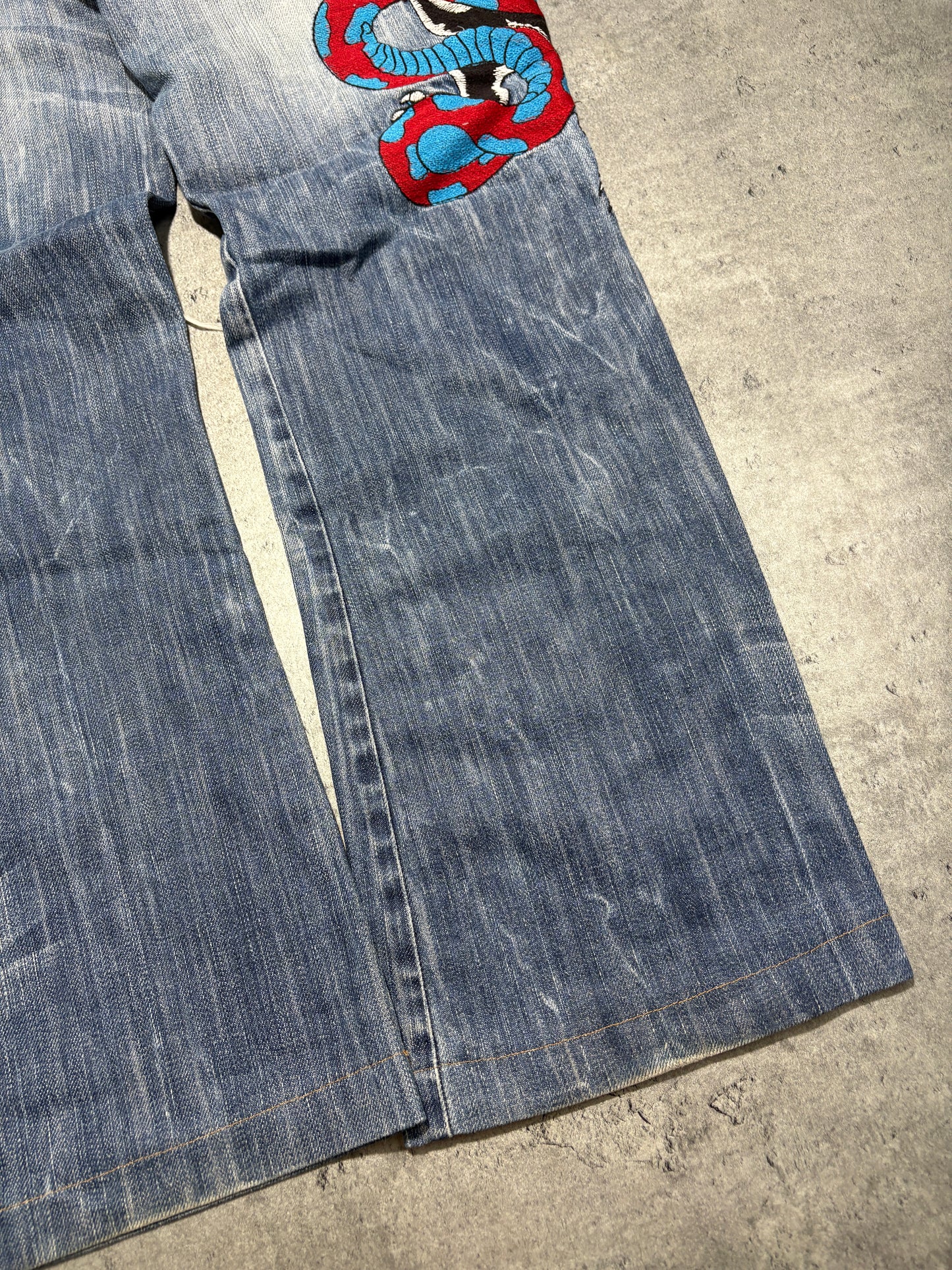 2000s distressed Rusty Neal embroidery jeans