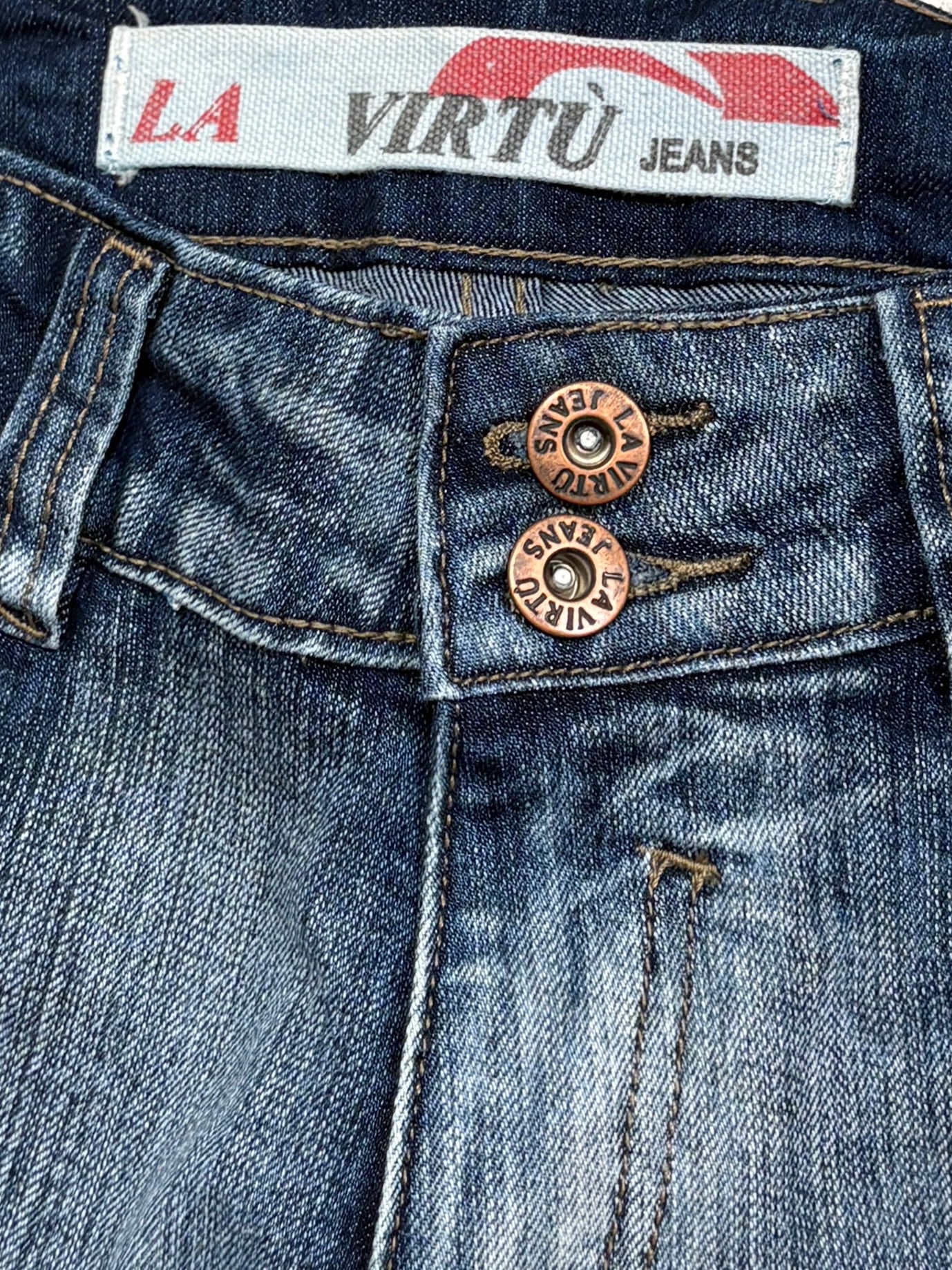 2000s Tribal flare washed jeans