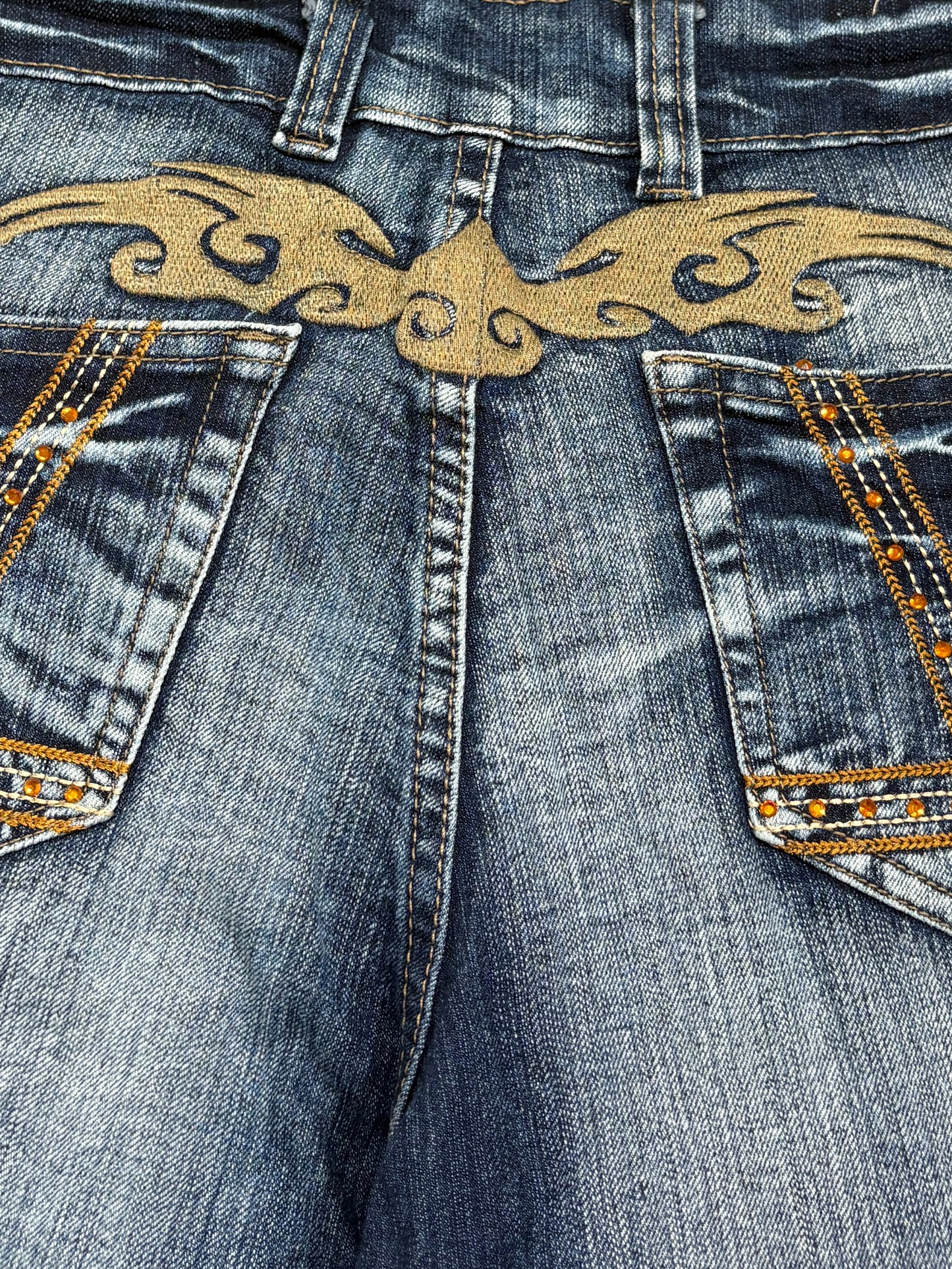 2000s Tribal flare washed jeans