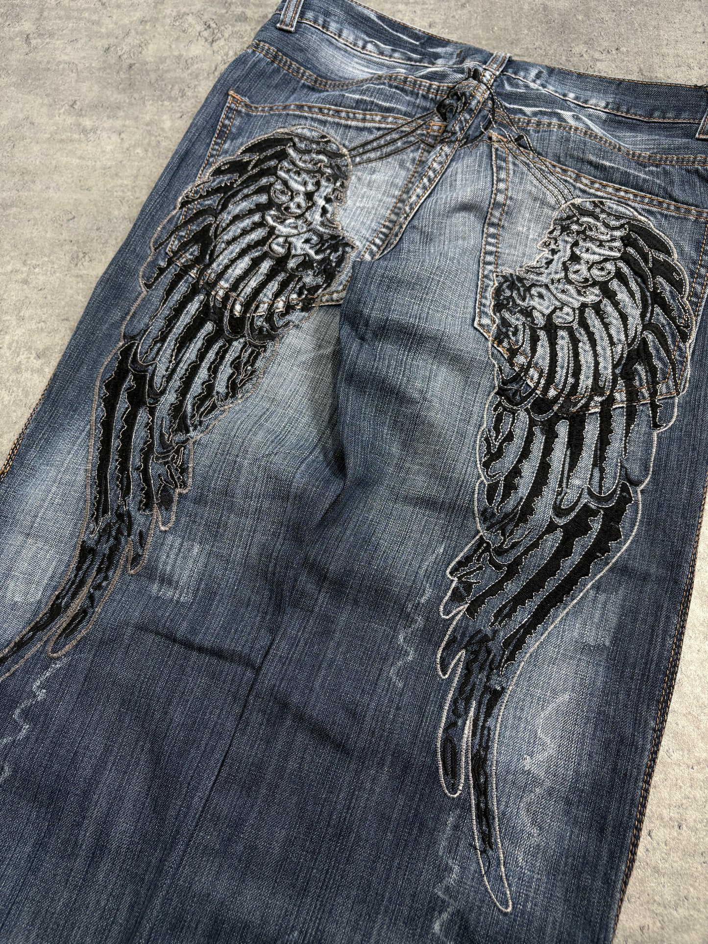 2000s Tribal Wings Washed Jeans