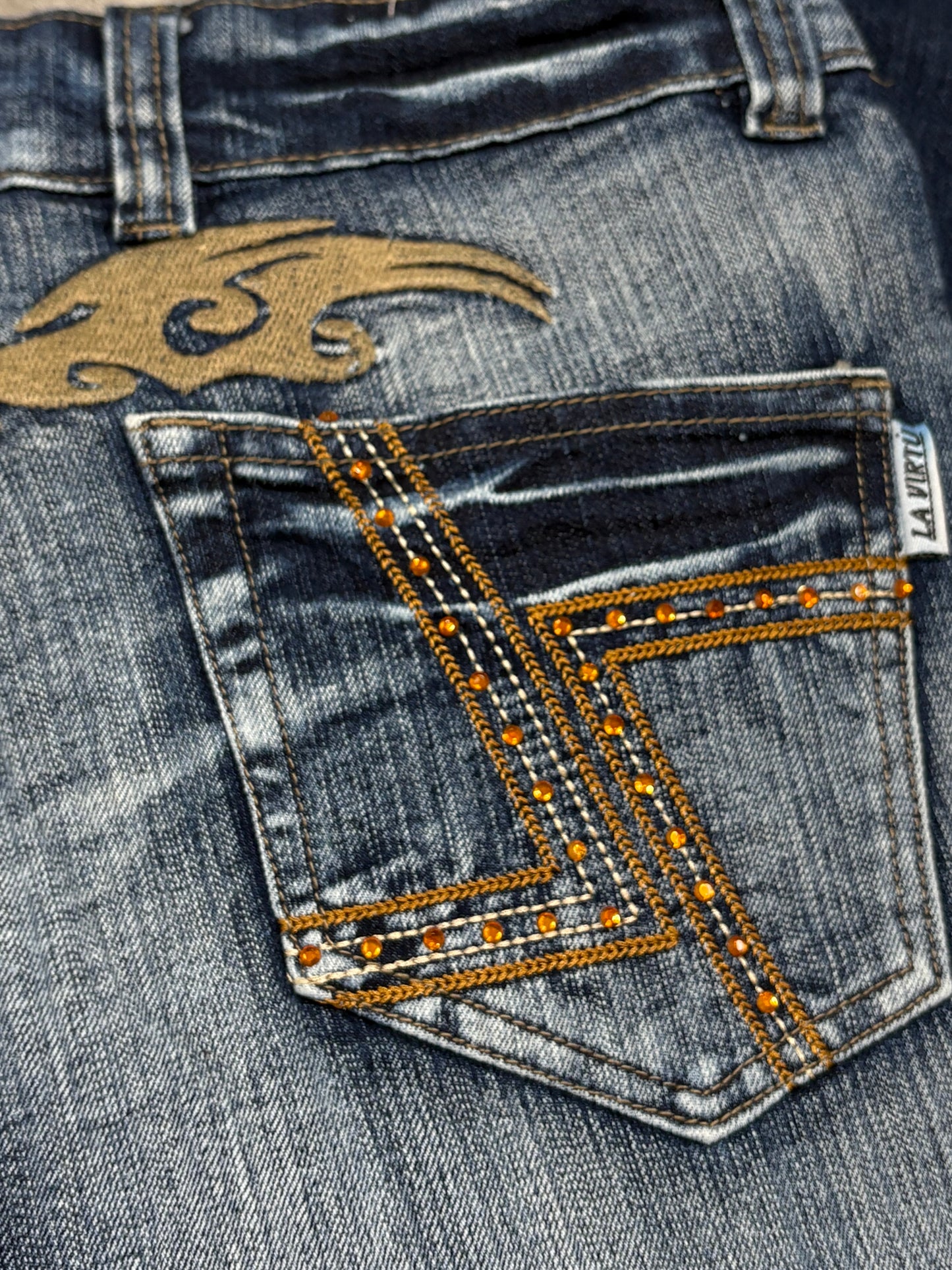 2000s Tribal flare washed jeans