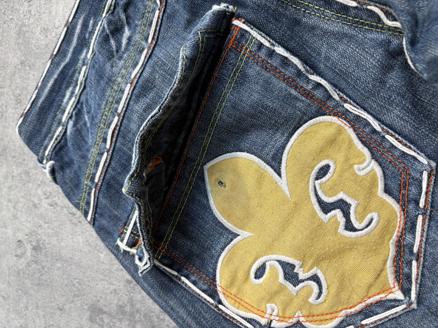 2000s Laguna Beach Chrome Tribal Skull Jeans