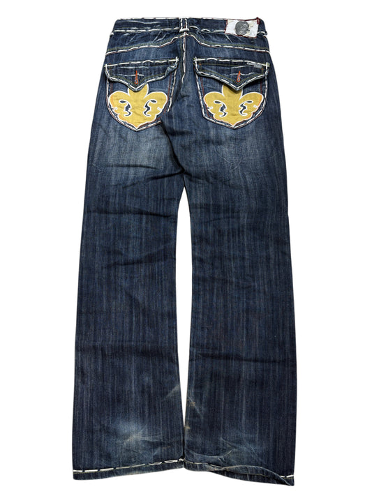 2000s Laguna Beach Chrome Tribal Skull Jeans