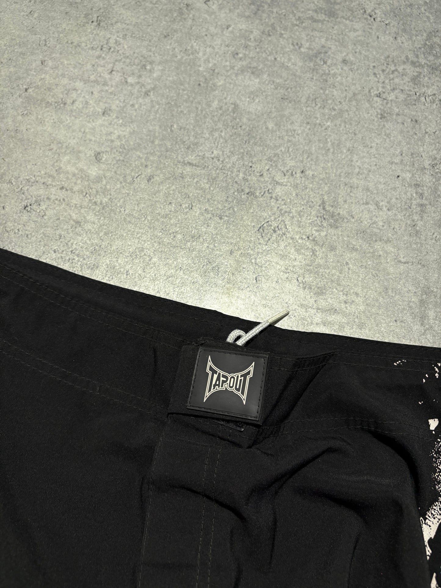 2000s Tapout skull shorts
