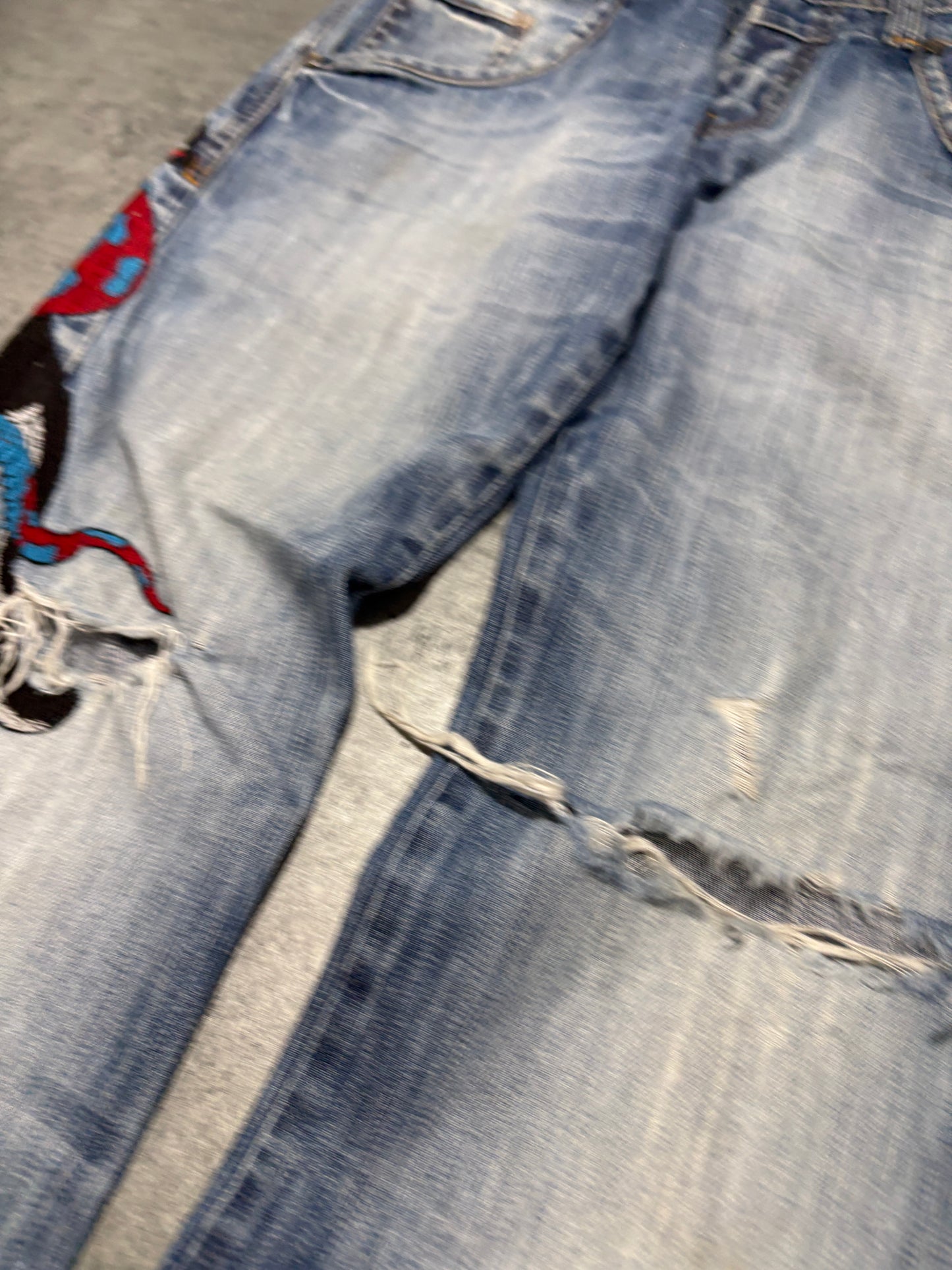 2000s distressed Rusty Neal embroidery jeans