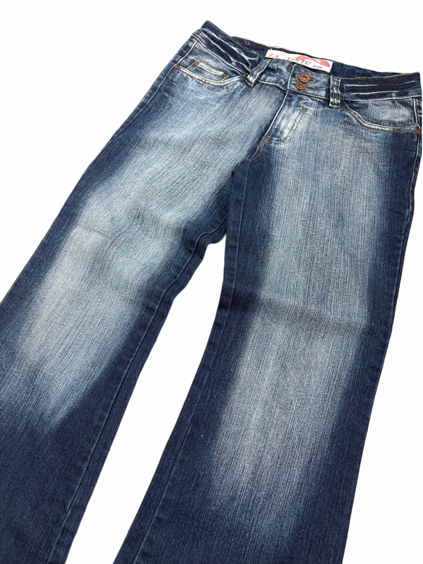2000s Tribal flare washed jeans