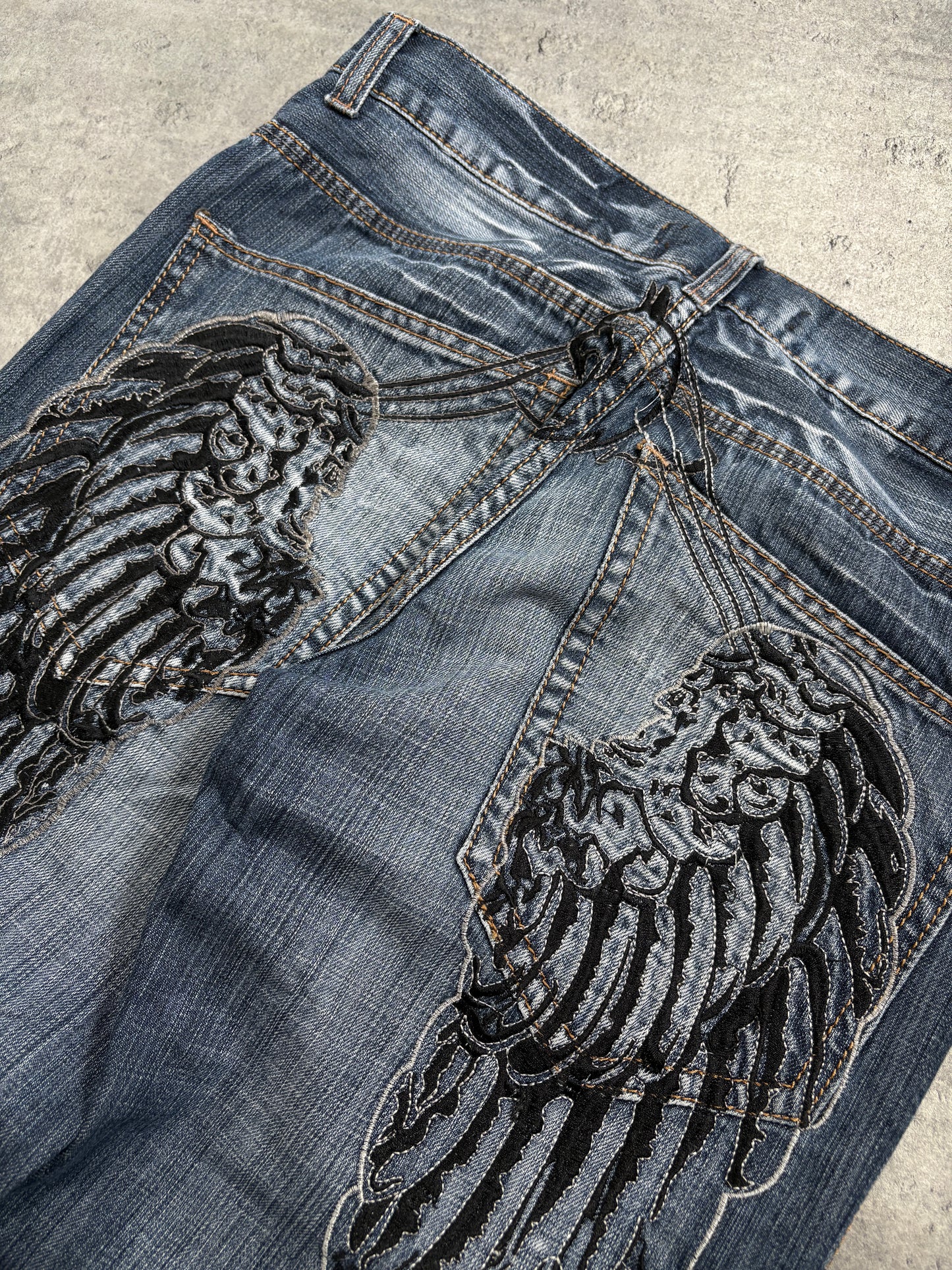 2000s Tribal Wings Washed Jeans