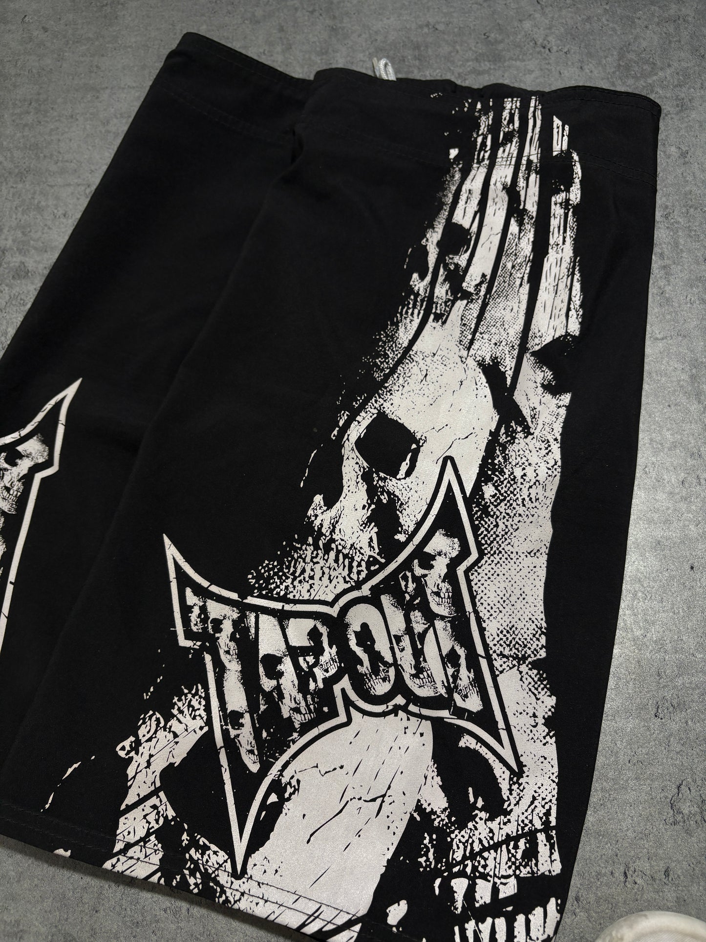 2000s Tapout skull shorts