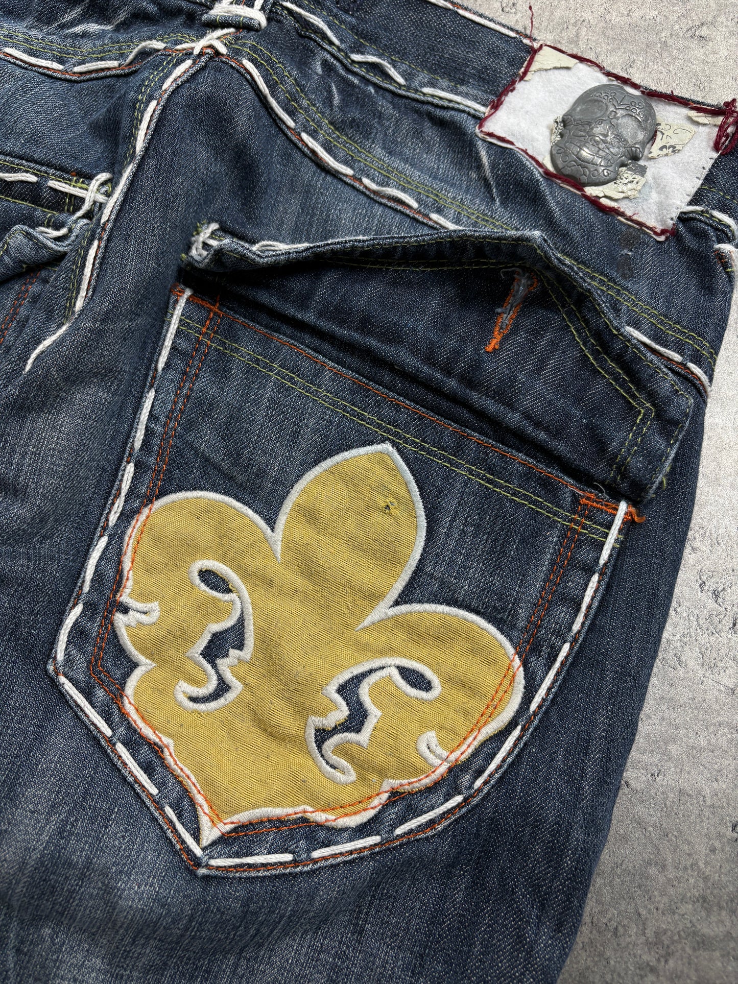 2000s Laguna Beach Chrome Tribal Skull Jeans