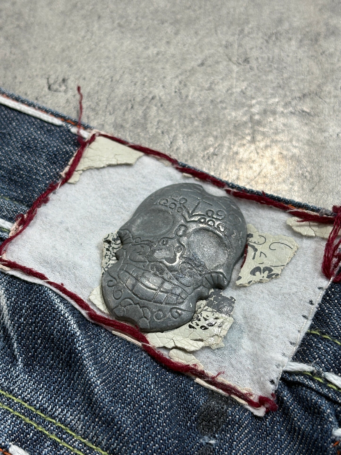 2000s Laguna Beach Chrome Tribal Skull Jeans
