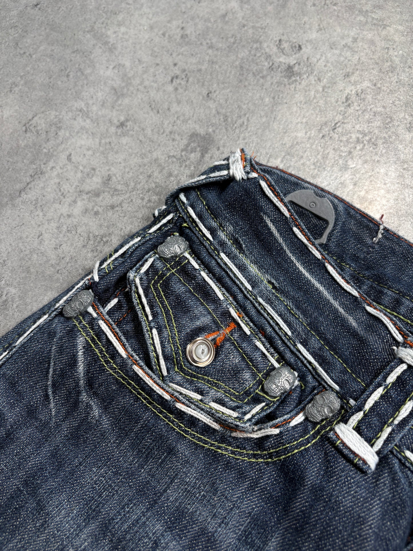 2000s Laguna Beach Chrome Tribal Skull Jeans